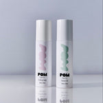 POM Saviour Oil and Soothing Spray bottles displayed together on a white background.
