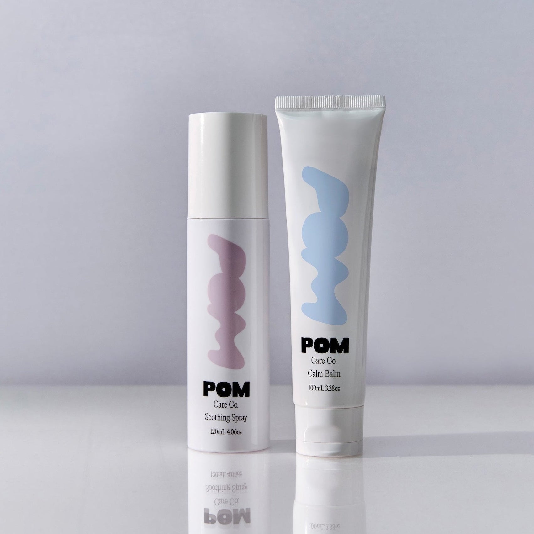 POM Soothing Spray bottle and Calm Balm tube displayed together on a white background.