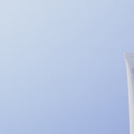 POM Calm Balm tube displayed against a soft blue background.